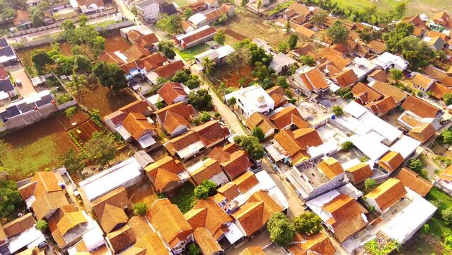 Aerial Photography. Hyper Lapse Landscape view of a settlement on the edge of the city. Residential district in the city of Cicalengka - Bandung, Indonesia. Shot from a drone flying 200 meters high