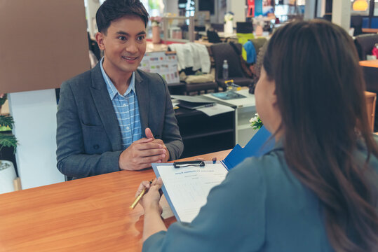 Job Interview with headhunter agent and applicant. Job HR applicants having an interview with Human resource manager jobs interviewing with confident candidate at business firm office give cv resume