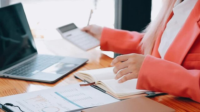Team of business people are meeting to analyze data for marketing plan,Market research reports and income statistics, Financial and Accounting concept.