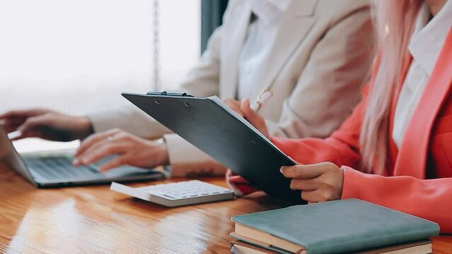 Team of business people are meeting to analyze data for marketing plan,Market research reports and income statistics, Financial and Accounting concept.