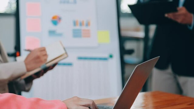 Team of business people are meeting to analyze data for marketing plan,Market research reports and income statistics, Financial and Accounting concept.