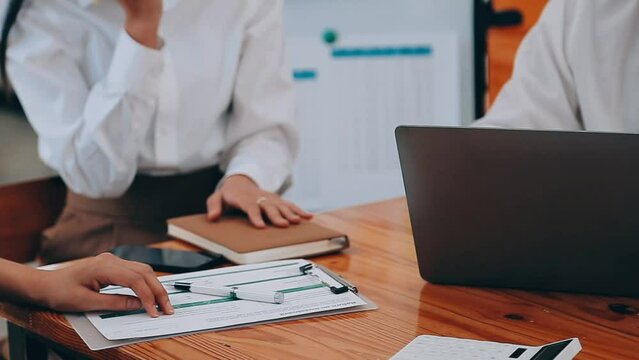 Team of business people are meeting to analyze data for marketing plan,Market research reports and income statistics, Financial and Accounting concept.