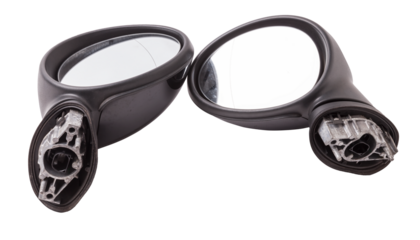 Close-up on a pair of side mirrors from a minibus with turn signal repeaters for repair and replacement after an accident in a workshop. Auto service industry. Spare parts catalog.