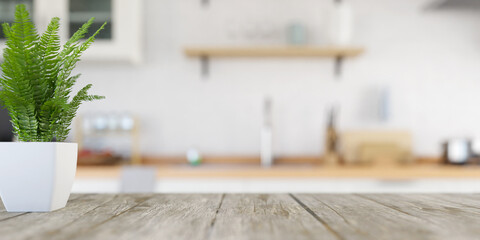 White kitchen interior background with focus on kitchen wooden table and blurred background. 3d...