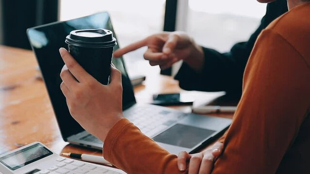 Team of business people are meeting to analyze data for marketing plan,Market research reports and income statistics, Financial and Accounting concept.