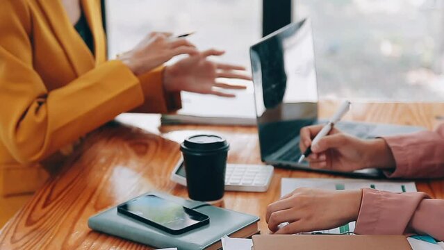 Team of business people are meeting to analyze data for marketing plan,Market research reports and income statistics, Financial and Accounting concept.
