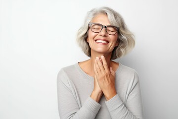 Smiling elderly woman, close-up of smiling elderly woman with white hair, healthy senior living