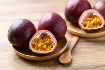 Passion fruit on wooden plate ready to eating, Tropical fruit in summer season
