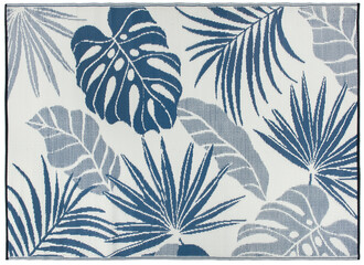 Beach carpet in light blue tones with tropical plant leaves pattern