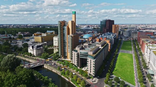 Aerial Drone shot of Potsdamer Platz ( Potsdam Square ) in the city centre. Modern architecture buildings and famous skyscrapers.