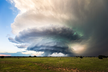 Supercell thunderstorm clouds over a field
