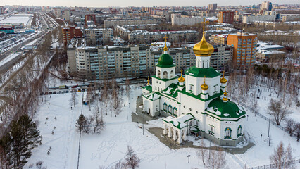 Tyumen, Russia - March 16, 2021: Aerial view on temple chapel in honor of Lady Day