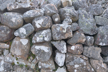 texture of limestone wall stacked together