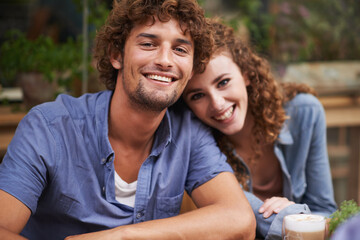Happy, love and portrait of couple at coffee shop on romantic, anniversary or morning date. Smile,...