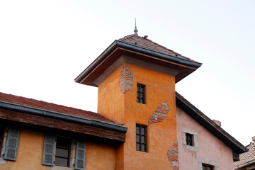 Old french european style traditional stone cottages, villas or houses, classic roof and brick work