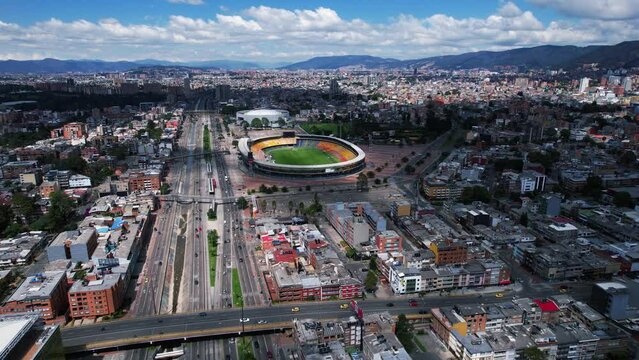 Bogota, Colombia. Aerial View of Highway Traffic and El Camp&iacute;n Football Stadium. Drone Shot