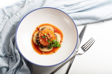 Modern gluten-free cuisine: buckwheat and chicken mince patties with mushrooms, tomato sauce, and micro basil greens. Health-conscious concept. Top view
