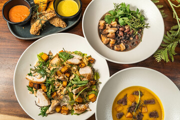 Starter, soup, salad and main course. Hotel meal. Delicious restaurant dishes. Several options.
