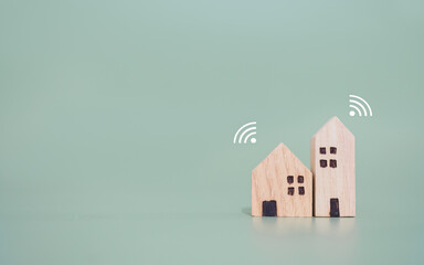 Miniature house with Wifi signal. The concept of network connect, internet of things, smart home...