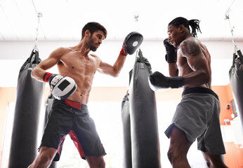 Men, boxing and training with gloves or pad or fighting performance or endurance challenge,...
