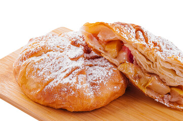 Baking puff pastry vertuta with apple or strudel