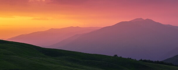 summer foggy scenery, scenic sunset view in the mountains, Carpathian mountains, Ukraine, Europe	