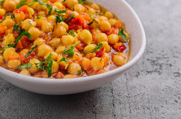 Cooked chickpeas in a white bowl