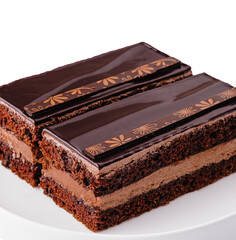 two sliced chocolate cake on a white plate