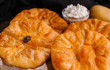 Cooking traditional pies with potato close up