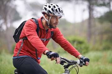 Health, bike and man cycling on forest field for adventure, discovery or off road sports hobby....