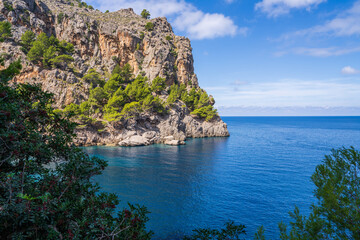Picturesque landscapes of Mallorca. Rocky coast, turquoise sea. Sunny day. Sa Calobra, Mallorca island, Spain, Balearic Islands.