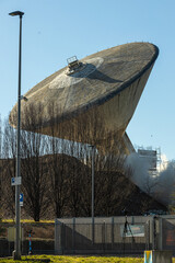 Tall building demoltion in italy.