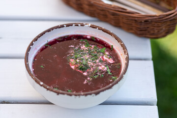 Borscht with herbs and sour cream