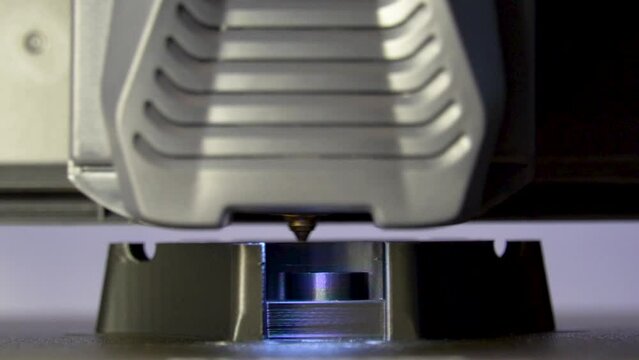 3D Printer Prints a Plastic Mechanical Gear in Slow Motion