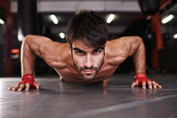 Man, portrait and push up or fitness in gym, athlete and topless for exercise and workout. Male...