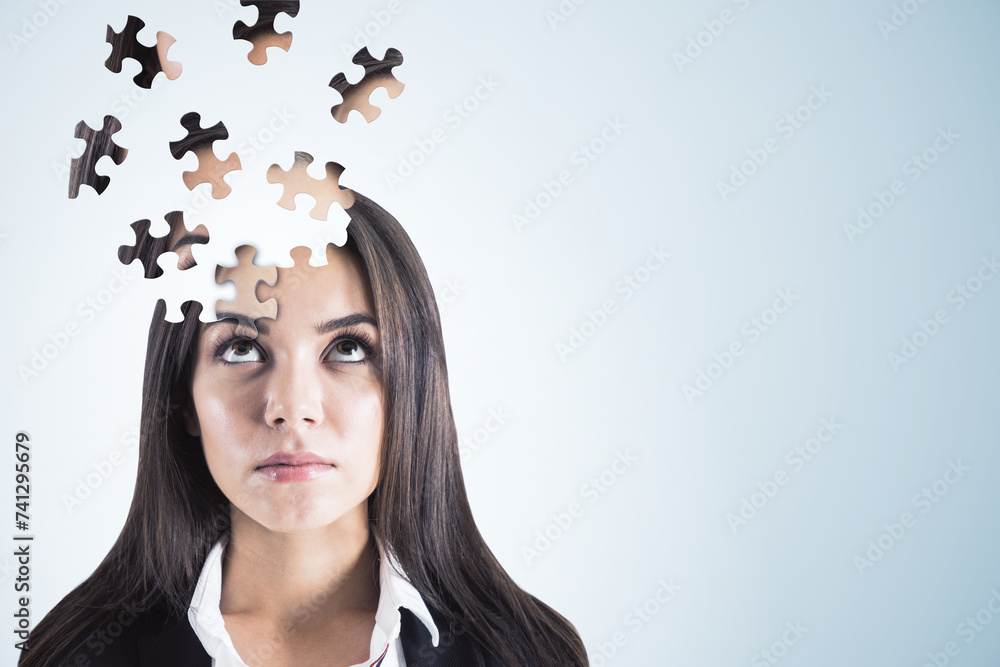 Poster Puzzle headed thoughtful female portrait on light background with mock up place. Solution, decision and brainstorm concept.