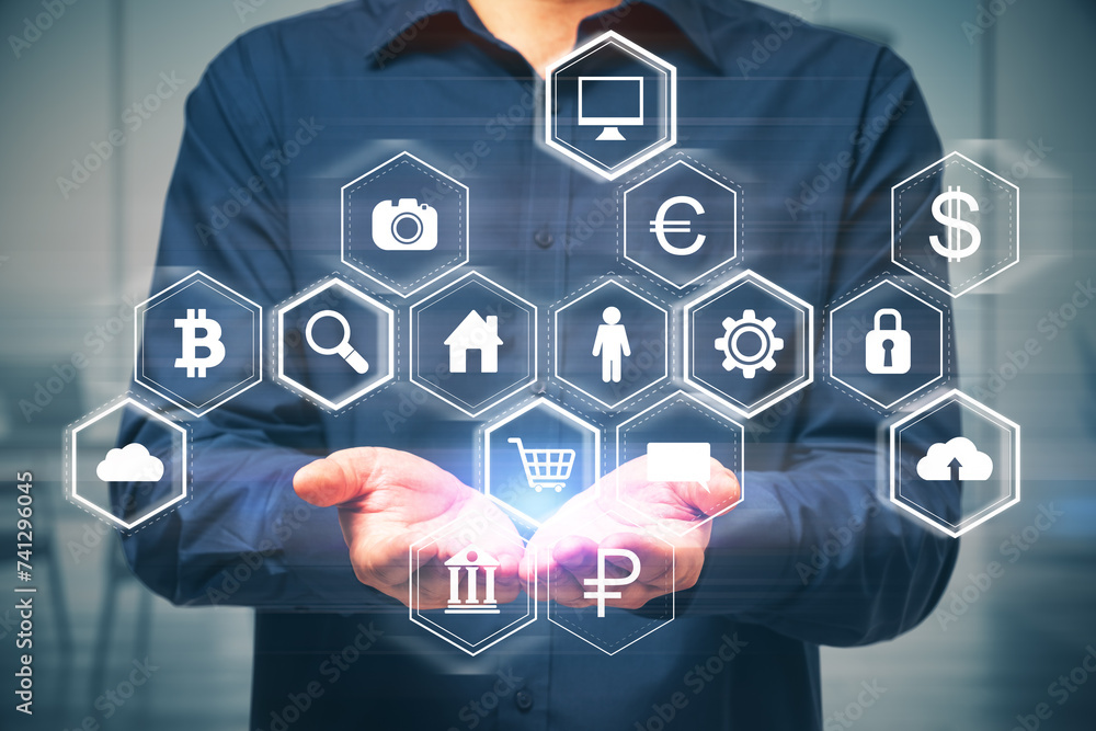 Poster close up of businessman hands holding abstract hexagonal pattern hologram with various business icon
