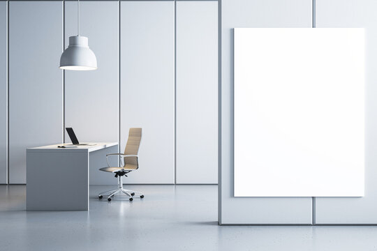 Minimalist office setup with white desk, chair, pendant lamp, and blank canvas. Clean design. 3D Rendering