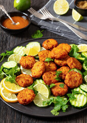 fried rice cutlets, rice tikki on black plate