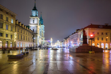 Beautiful architecture of the Royal Route with Christmas illuminations in Warsaw. Poland