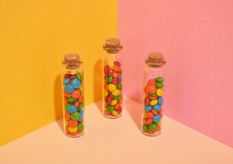 Candy in glass jars. Composition of delicious beauty.
