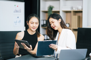 Project manager working and update tasks with milestones progress planning and professional investor working new start up project in the office.