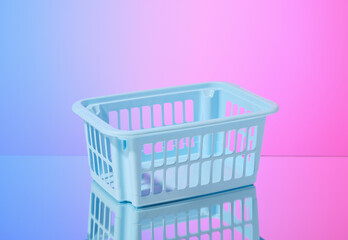 Blue empty basket for storing items or cleaning supplies. Copy space for text.