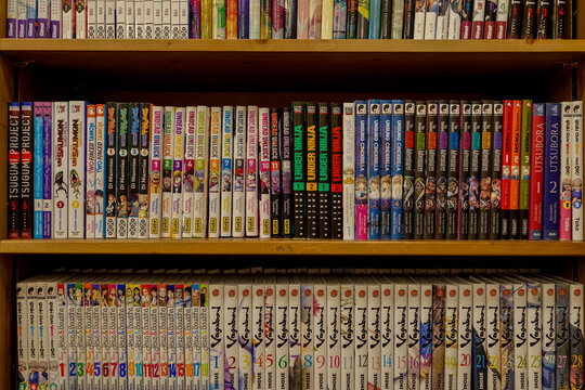 bookshelves full of mangas , animes and popular japanese comic books , Paris, France 6 june 2023