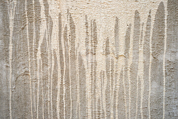 Close up of cement water stains from construction on the cement wall