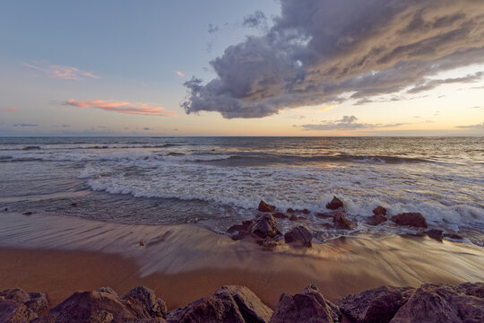 Amazing sunrise over Kekaha Beach, Island of Kauai, Hawaii
