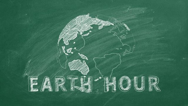 Rotating globe with lettering EARTH HOUR hand drawn in chalk on a school greenboard. Save the World. Save our planet.
