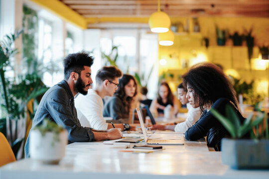 Diverse team collaboration in coworking space. Generative AI