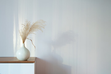 dry cereal ornamental plants in vase on background white wall