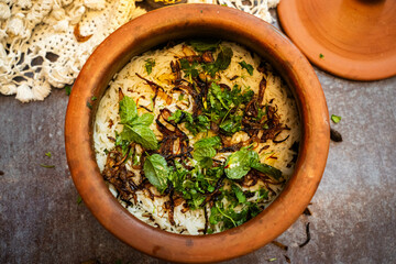 Vegetable Pulao Desi Handi Style is prepared in an earthen or clay pot called Haandi or 1 kilo size. Popular Indian vegetarian rice Veg Dum Biryani Recipe Veg Biryani in Pot Clay, Matka Biryani - obrazy, fototapety, plakaty